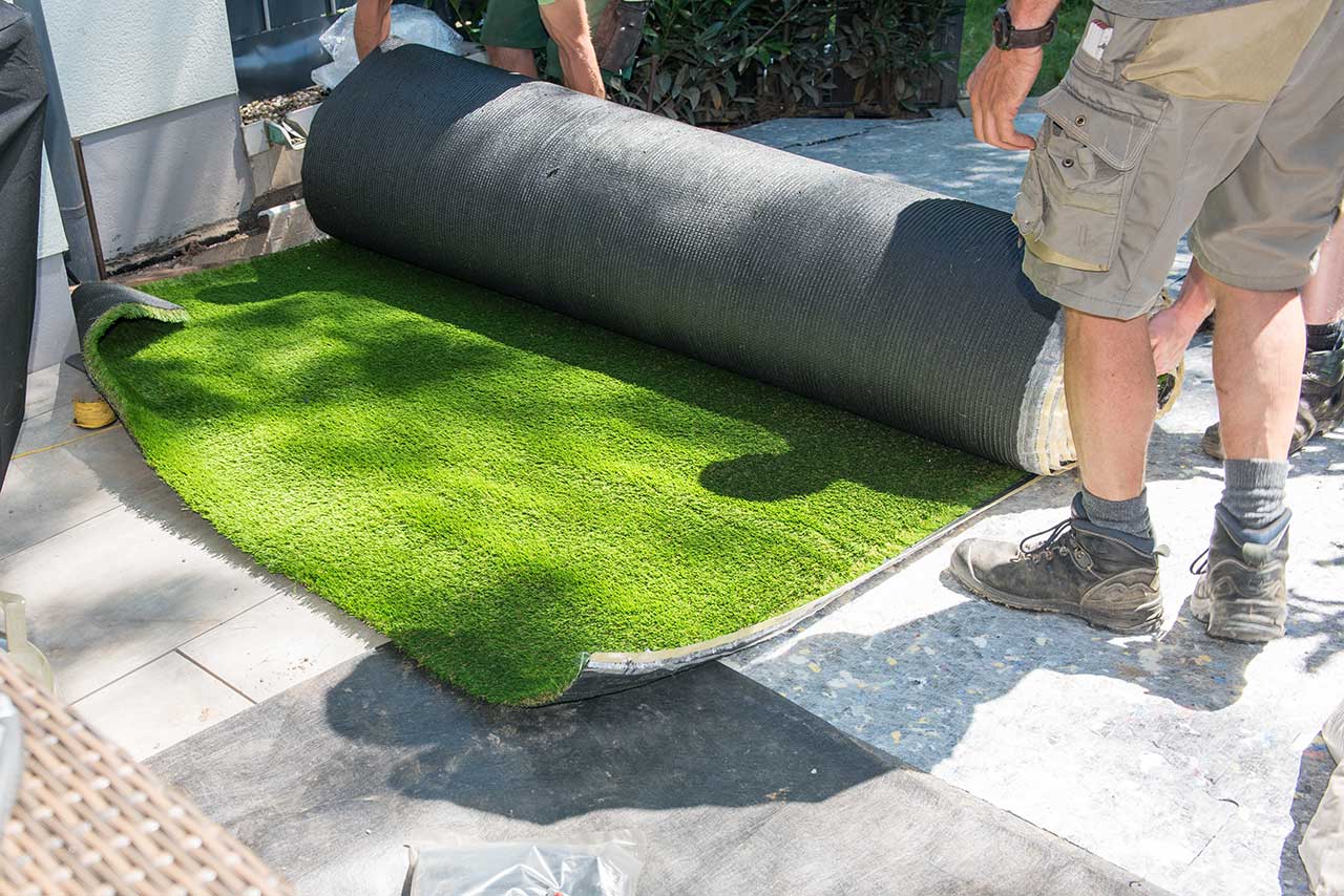 Professional installers rolling out artificial turf